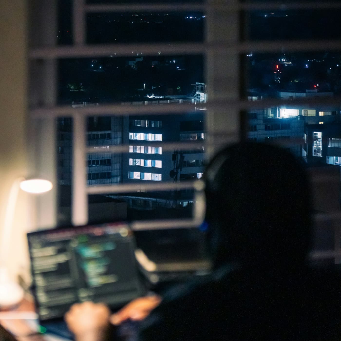 A team member concentrating at their desk