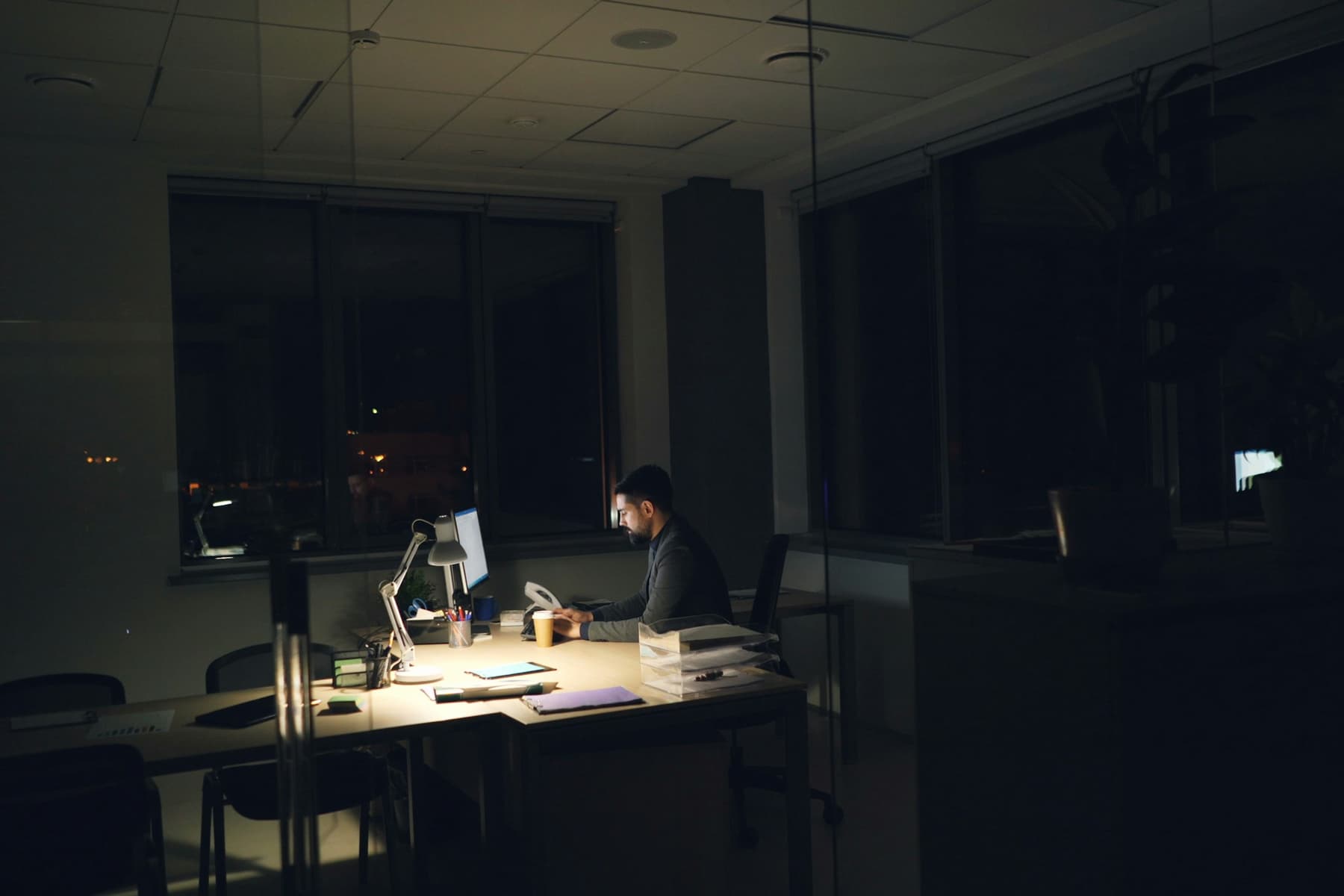 A team member walking a client through a monthly report on a video call